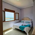 Un Salto Y A La Playa Апартаменты Торевьиа