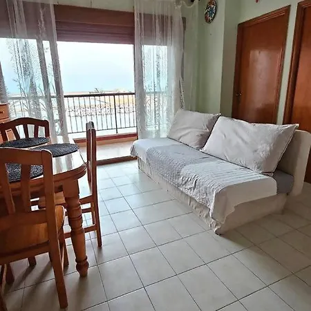 Un Salto Y A La Playa Апартаменты Торевьиа